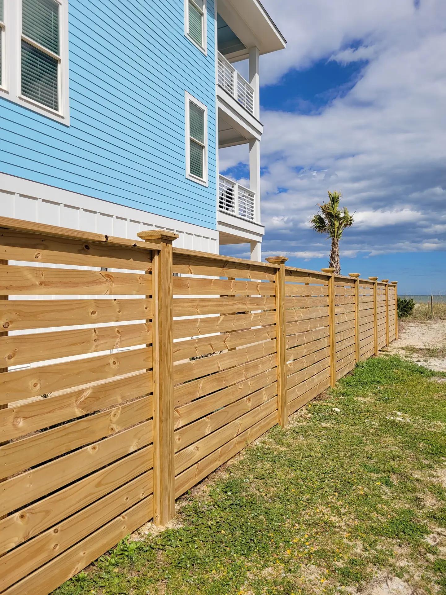 Horizontal wooden privacy fence with modern design